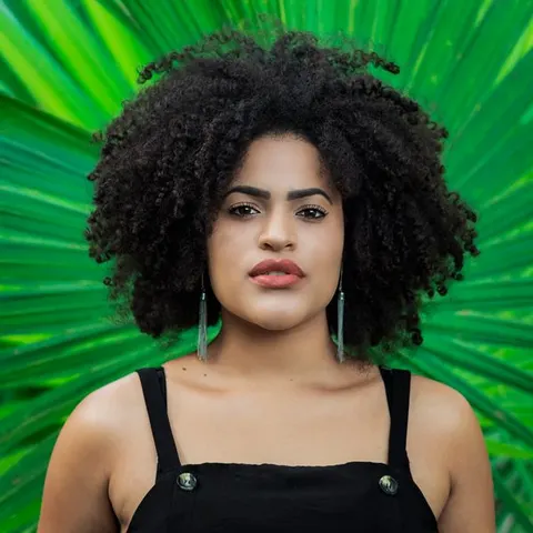 Natural afro curls shaped and defined