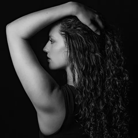 Side profile of curls, black and white