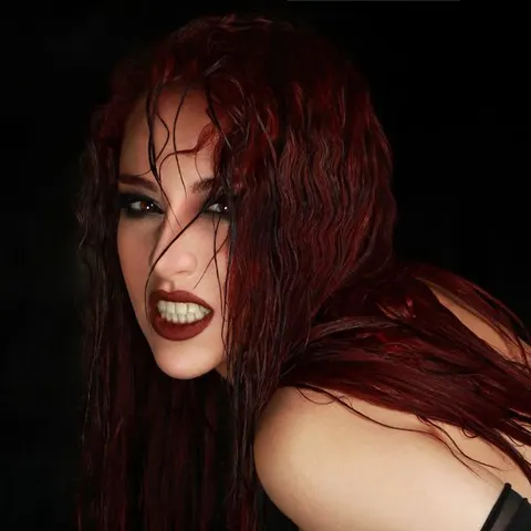 Freshly coloured red hair at the basin